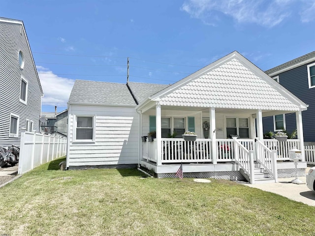 251 38th St, Brigantine, NJ 08203 - back of house featuring a porch
