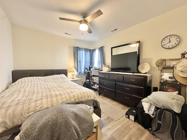 251 38th St, Brigantine, NJ 08203 - bedroom with light wood-style floors and a ceiling fan