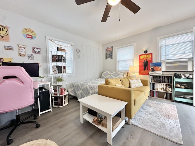251 38th St, Brigantine, NJ 08203 - living area with wood finished floors, a ceiling fan, cooling unit, and an office area