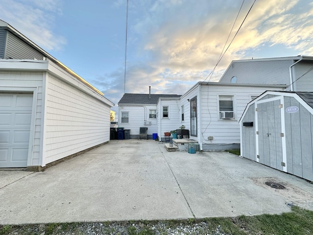 251 38th St, Brigantine, NJ 08203 - back of house with cooling unit and a patio