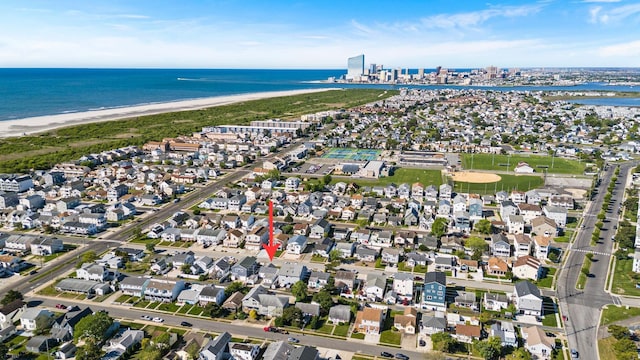 251 38th St, Brigantine, NJ 08203 - aerial view of property and surrounding area featuring extended coastline and nearby suburban area