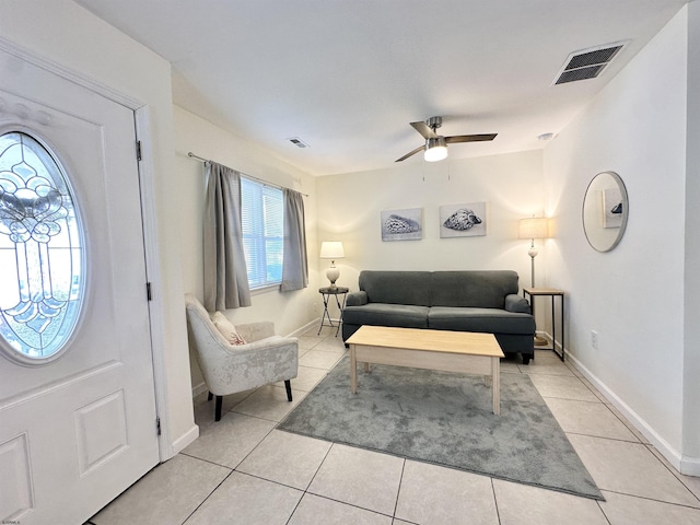 251 38th St, Brigantine, NJ 08203 - living room with ceiling fan, light tile patterned flooring, and baseboards