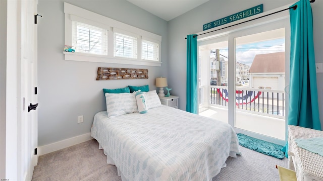 305 15th St, Ocean City, NJ 08226 - carpeted bedroom featuring baseboards and access to exterior