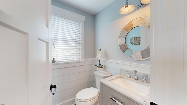 305 15th St, Ocean City, NJ 08226 - bathroom featuring vanity, toilet, and a wainscoted wall
