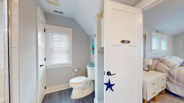 305 15th St, Ocean City, NJ 08226 - ensuite bathroom featuring lofted ceiling, toilet, and baseboards