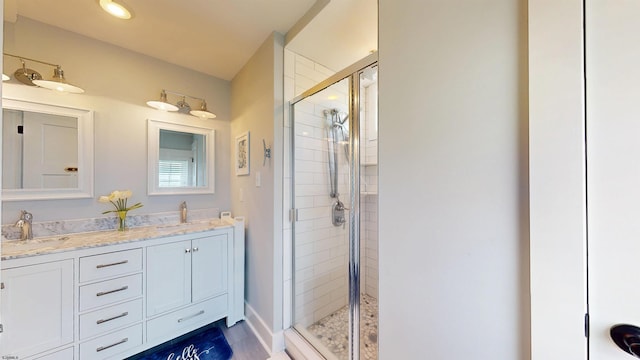 305 15th St, Ocean City, NJ 08226 - bathroom featuring a shower stall, double vanity, and recessed lighting
