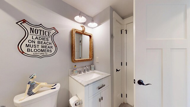 305 15th St, Ocean City, NJ 08226 - half bathroom featuring vanity and toilet