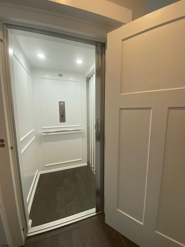 305 15th St, Ocean City, NJ 08226 - elevator with wood finished floors and recessed lighting