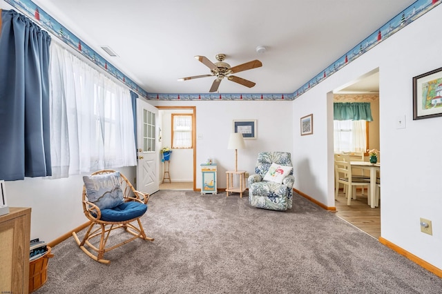 510 Lafayette Blvd, Brigantine, NJ 08203 - living area with plenty of natural light, ceiling fan, baseboards, and carpet flooring