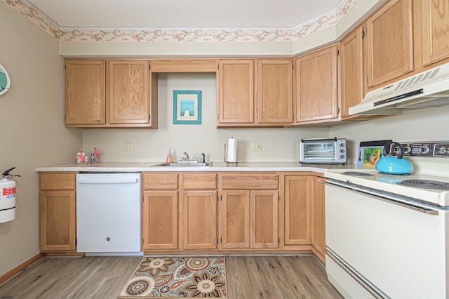 510 Lafayette Blvd, Brigantine, NJ 08203 - kitchen featuring white appliances, under cabinet range hood, light wood-style floors, light countertops, and a sink