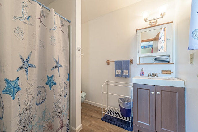 510 Lafayette Blvd, Brigantine, NJ 08203 - full bathroom with toilet, vanity, wood finished floors, baseboards, and a shower with curtain