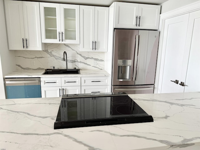 5000 Boardwalk Unit 1616, Ventnor, NJ 08406 - kitchen with stainless steel refrigerator with ice dispenser, dishwasher, a sink, cooktop, and backsplash