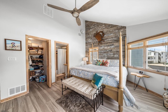 36 S Inlet Dr Unit 2, Ocean City, NJ 08226 - bedroom featuring wood finished floors, high vaulted ceiling, baseboards, and ceiling fan