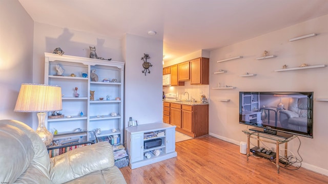 9600 Amherst Ave Unit 3, Margate, NJ 08402 - living area with light wood-type flooring and baseboards