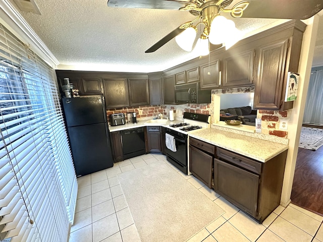 160 Rumson Dr Unit 1053, Galloway Township, NJ 08205 - kitchen featuring black appliances, a sink, light countertops, crown molding, and a ceiling fan