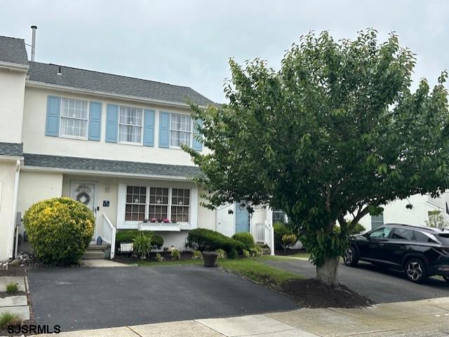 316 Gull Cv, Brigantine, NJ 08203 - view of front facade featuring stucco siding