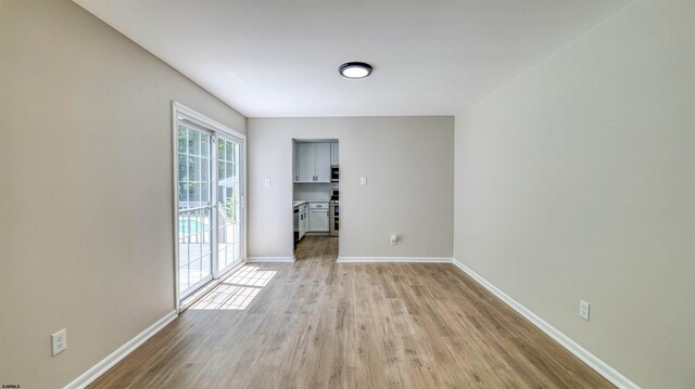 11 Carann Ln, Egg Harbor Township, NJ 08234 - spare room featuring light wood-style floors and baseboards