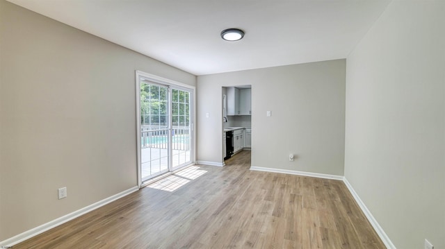 11 Carann Ln, Egg Harbor Township, NJ 08234 - spare room with light wood finished floors, baseboards, and a sink