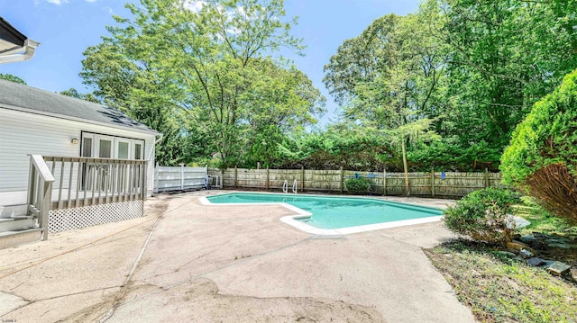 11 Carann Ln, Egg Harbor Township, NJ 08234 - view of swimming pool with a fenced backyard, a patio, french doors, and view of wooded area