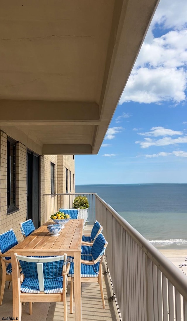 5000 Boardwalk Unit 1617, Ventnor, NJ 08406 - balcony featuring view of water and beach and outdoor dining space