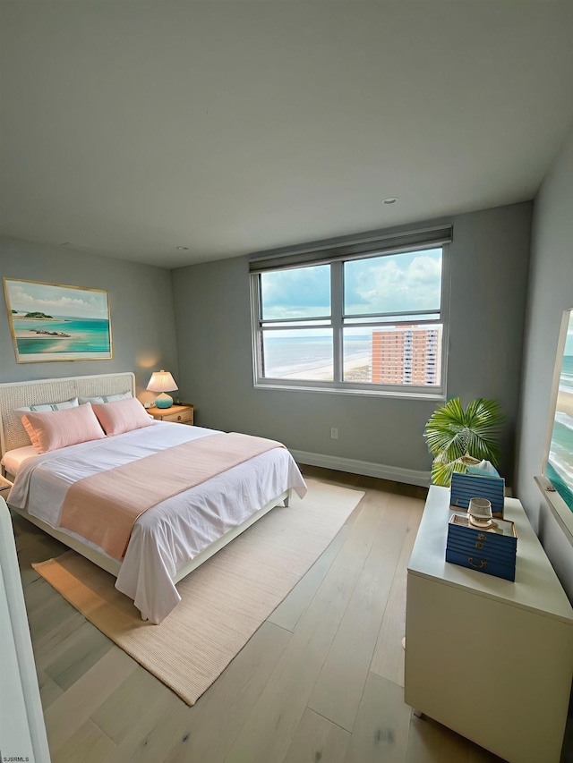5000 Boardwalk Unit 1617, Ventnor, NJ 08406 - bedroom with light wood-style floors and baseboards