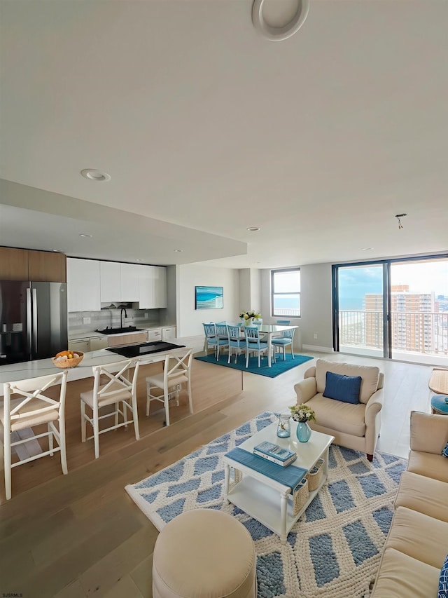 5000 Boardwalk Unit 1617-1616, Ventnor, NJ 08406 - living room featuring light wood-type flooring and recessed lighting