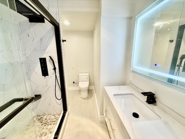 5000 Boardwalk Unit 1617-1616, Ventnor, NJ 08406 - full bathroom with a marble finish shower, vanity, toilet, and baseboards