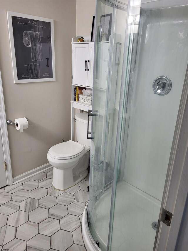 709 E Cooper Ferry Ct Unit 709, Galloway Township, NJ 08205 - full bathroom featuring toilet, a shower stall, and baseboards