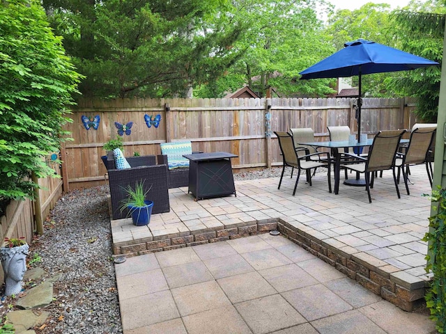 709 E Cooper Ferry Ct Unit 709, Galloway Township, NJ 08205 - fenced backyard with outdoor dining area and a patio area