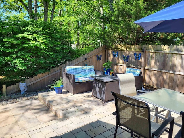 709 E Cooper Ferry Ct Unit 709, Galloway Township, NJ 08205 - fenced backyard with a patio and outdoor dining area