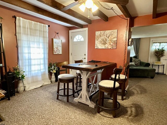 311 N 7th St, Millville, NJ 08332 - carpeted dining area featuring beamed ceiling, ceiling fan, and healthy amount of natural light