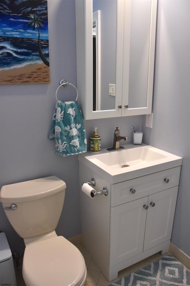 305 Battersea Rd Unit 2, Ocean City, NJ 08226 - bathroom with toilet, vanity, baseboards, and tile patterned flooring