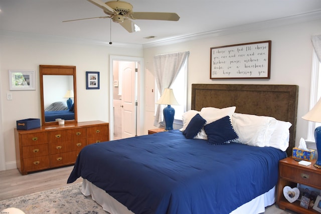 305 Battersea Rd Unit 2, Ocean City, NJ 08226 - bedroom featuring crown molding, light wood-style floors, and a ceiling fan