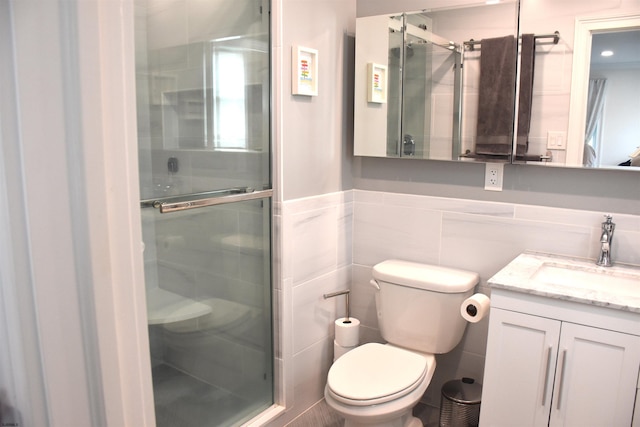 305 Battersea Rd Unit 2, Ocean City, NJ 08226 - bathroom with vanity, a shower stall, toilet, and tile walls