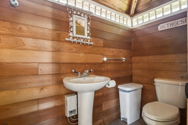 515 Bella Ct, Galloway Township, NJ 08205 - half bathroom with toilet, wooden walls, and a sink