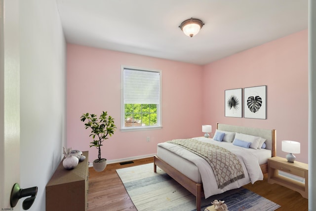 515 Bella Ct, Galloway Township, NJ 08205 - bedroom featuring baseboards and wood finished floors