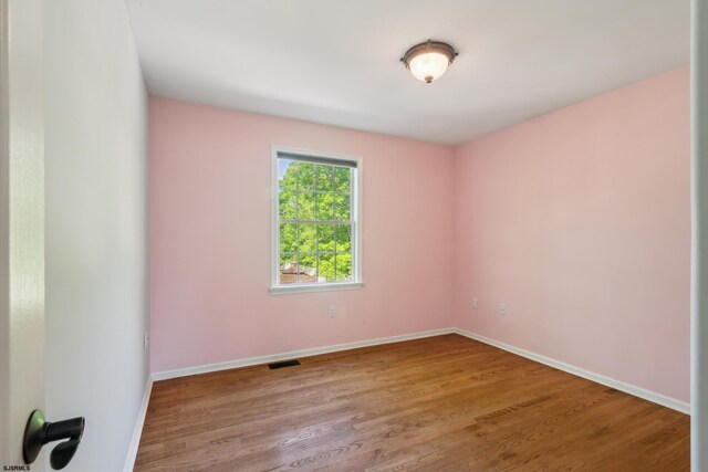 515 Bella Ct, Galloway Township, NJ 08205 - spare room with wood finished floors and baseboards