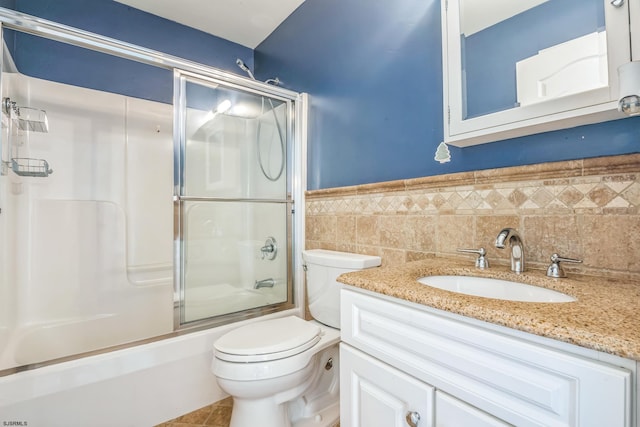 515 Bella Ct, Galloway Township, NJ 08205 - bathroom with toilet, vanity, combined bath / shower with glass door, wainscoting, and tile walls