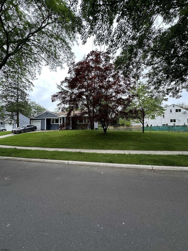 1634 S Bowling Green Dr, Cherry Hill, NJ 08003 - view of front of property featuring a front yard, a garage, and asphalt driveway