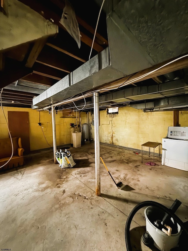 4 E Finley Rd, Upper Deerfield Township, NJ 08302 - unfinished below grade area featuring washer / dryer and water heater