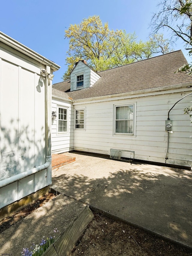 4 E Finley Rd, Upper Deerfield Township, NJ 08302 - rear view of house with a patio area and a shingled roof