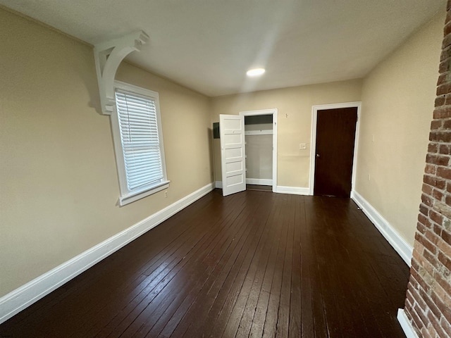220 Seaside Ave, Atlantic City, NJ 08401 - unfurnished bedroom featuring dark wood-type flooring and baseboards