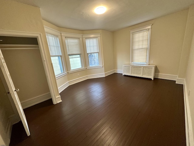220 Seaside Ave, Atlantic City, NJ 08401 - unfurnished bedroom featuring dark wood-style floors and baseboards