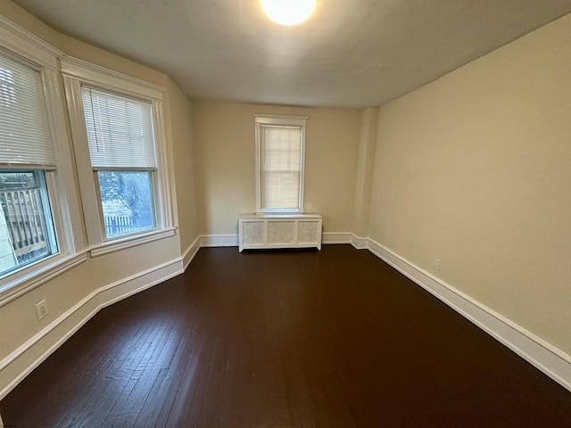 220 Seaside Ave, Atlantic City, NJ 08401 - unfurnished room featuring baseboards and dark wood-style flooring
