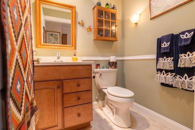71 Zion Rd, Egg Harbor Township, NJ 08234 - half bathroom with toilet, baseboards, tile patterned flooring, and vanity