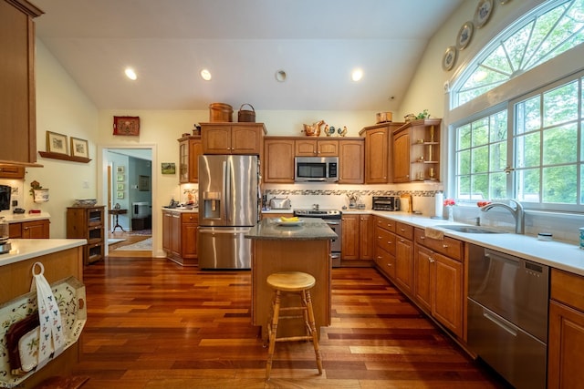 71 Zion Rd, Egg Harbor Township, NJ 08234 - kitchen with stainless steel appliances, a sink, brown cabinets, dark wood-type flooring, and high vaulted ceiling