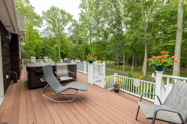 71 Zion Rd, Egg Harbor Township, NJ 08234 - wooden terrace with view of wooded area and a hot tub