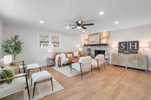 118 Colwick Dr, Somers Point, NJ 08244 - living room featuring a fireplace, a ceiling fan, light wood-style flooring, baseboards, and recessed lighting