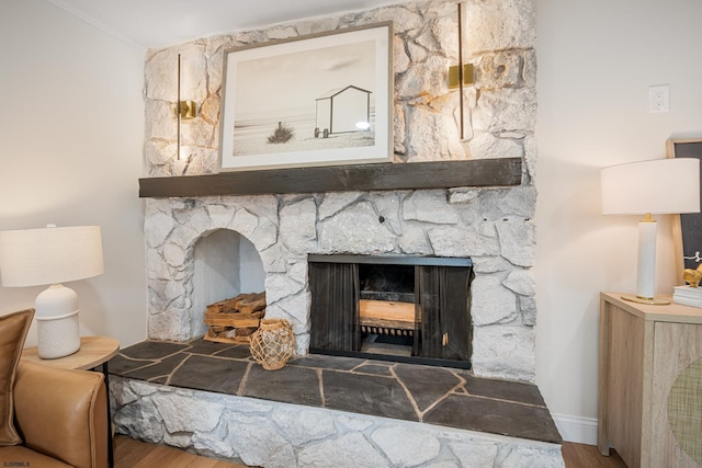 118 Colwick Dr, Somers Point, NJ 08244 - detailed view of wood finished floors, a stone fireplace, and baseboards