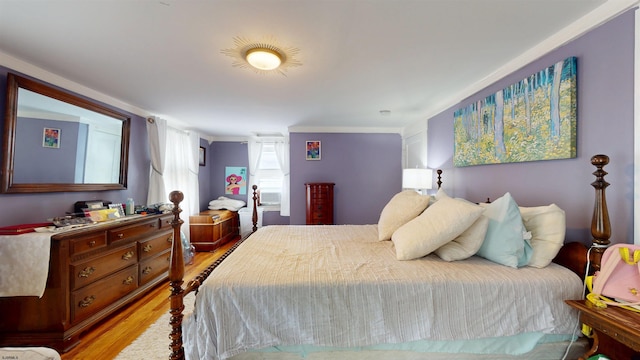 27 School St, Absecon, NJ 08201 - bedroom with light wood-type flooring and ornamental molding